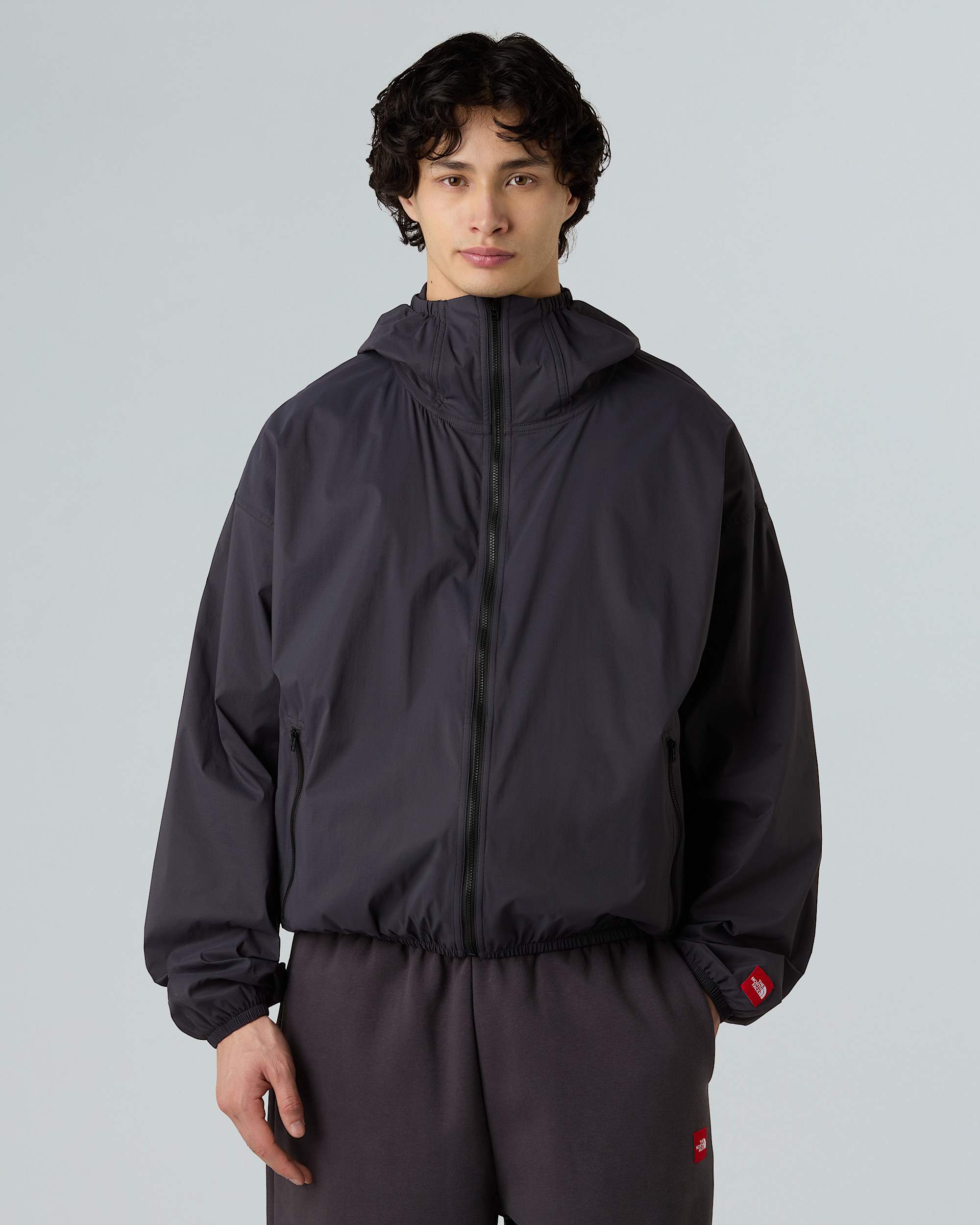Unisex Red Box Packable Hooded Wind Jacket TNF ALT4