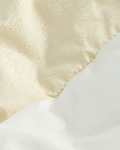 Nuketo Synthetische Isolatiejas voor dames TNF White DuneDesert Stone ALT27