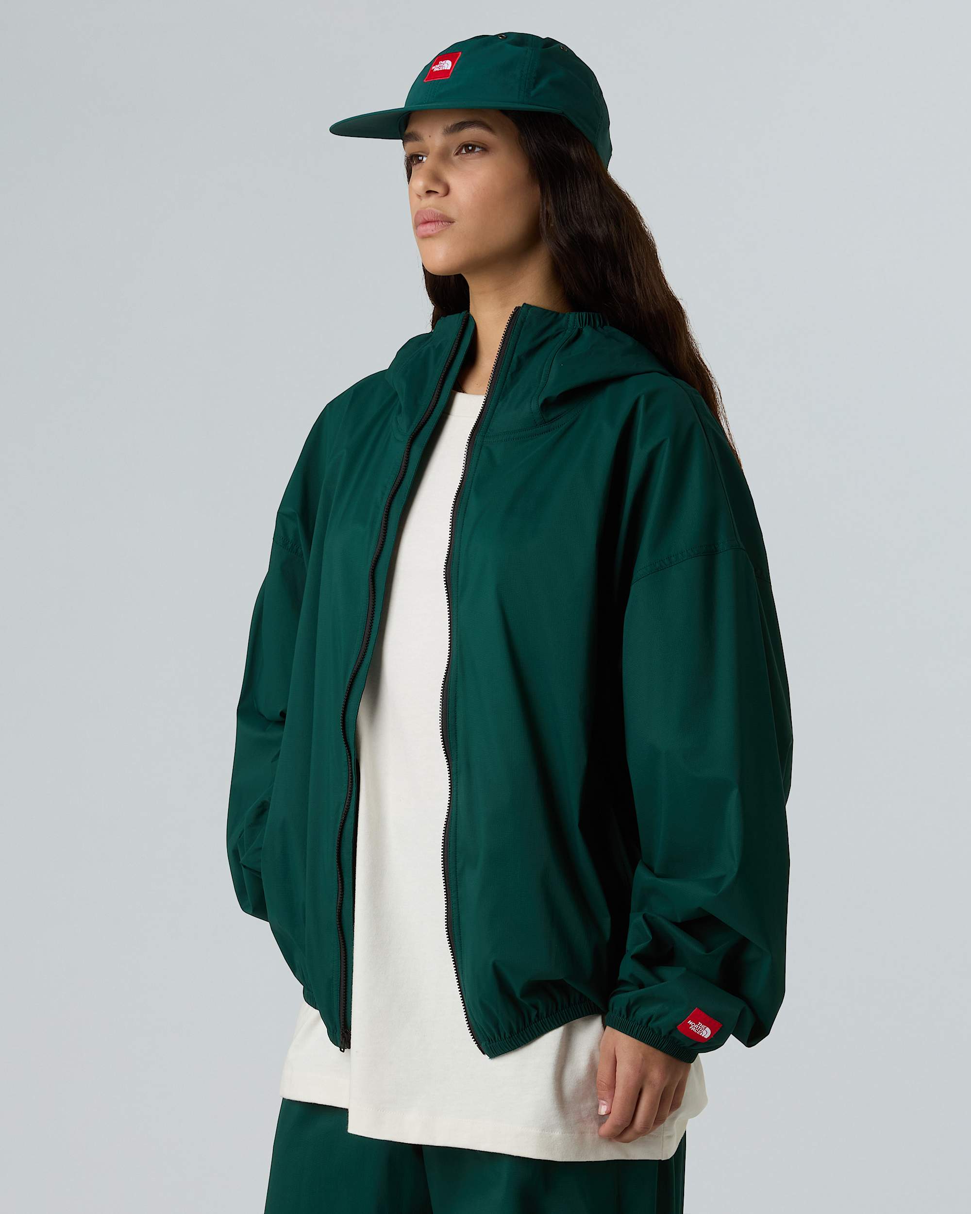 Veste  capuche coupevent compressible Red Box unisexe TNF alt14