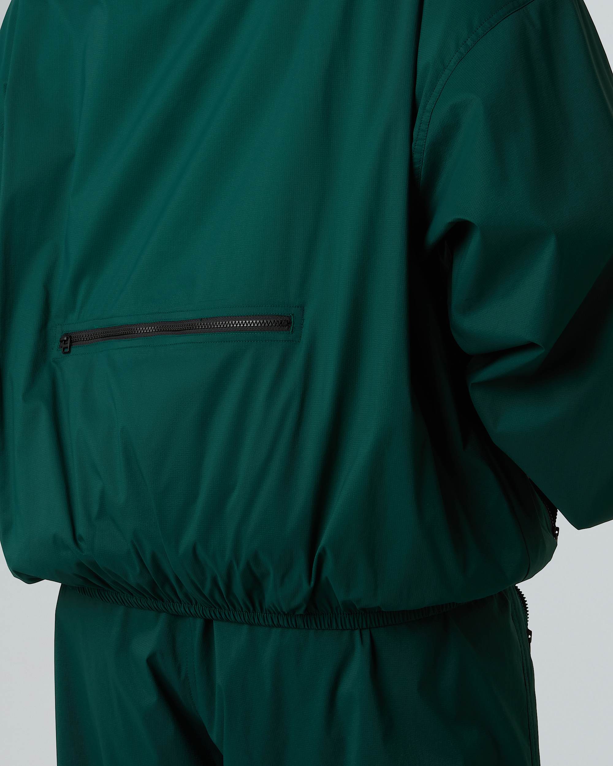 Veste  capuche coupevent compressible Red Box unisexe TNF alt17