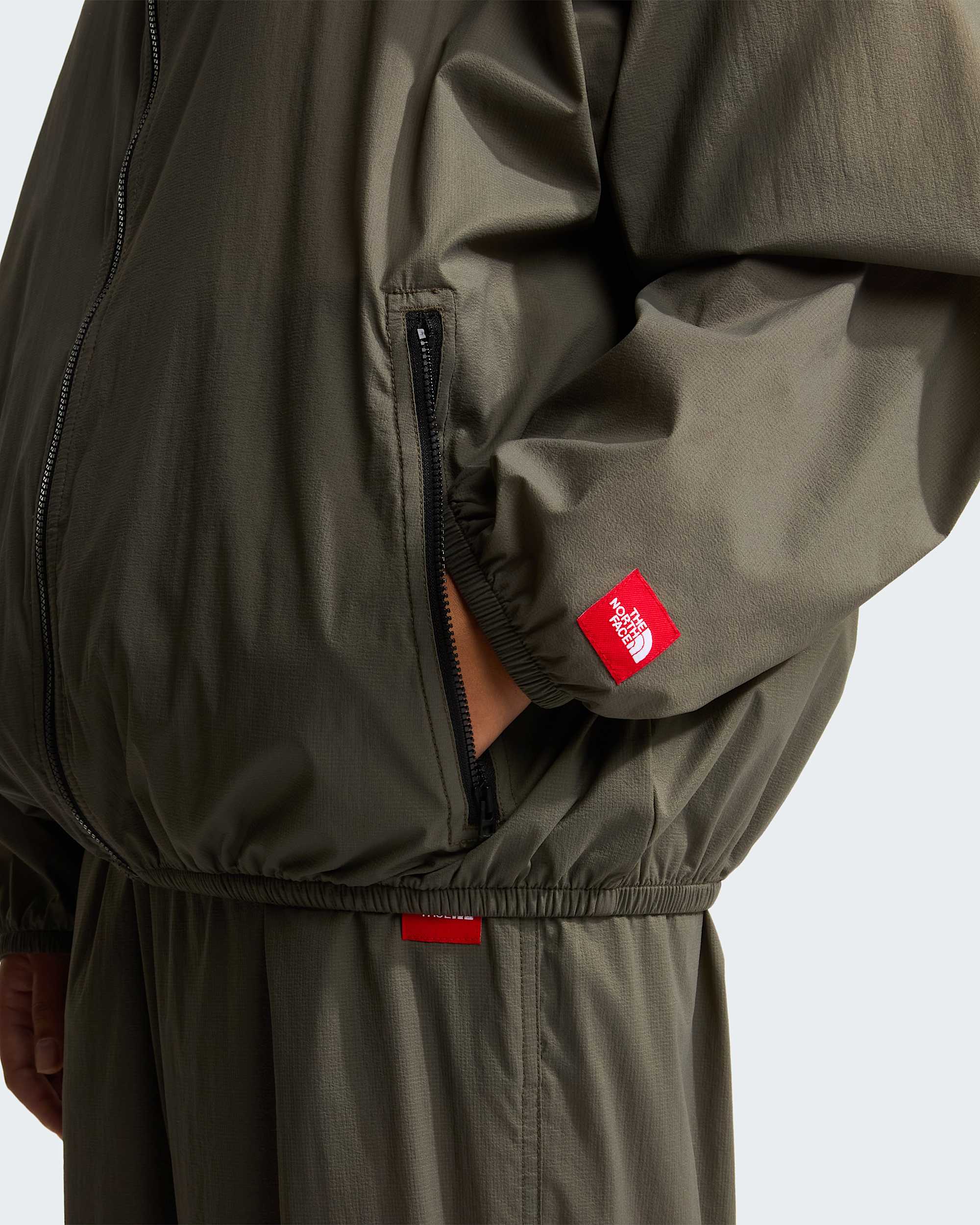 Unisex Red Box Packable Hooded Wind Jacket TNF alt20