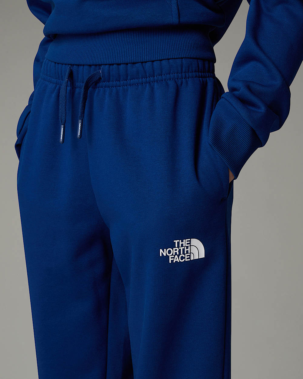 Regulr  konisch geschnittene Jogginghose fr Jugendliche TNF alt4