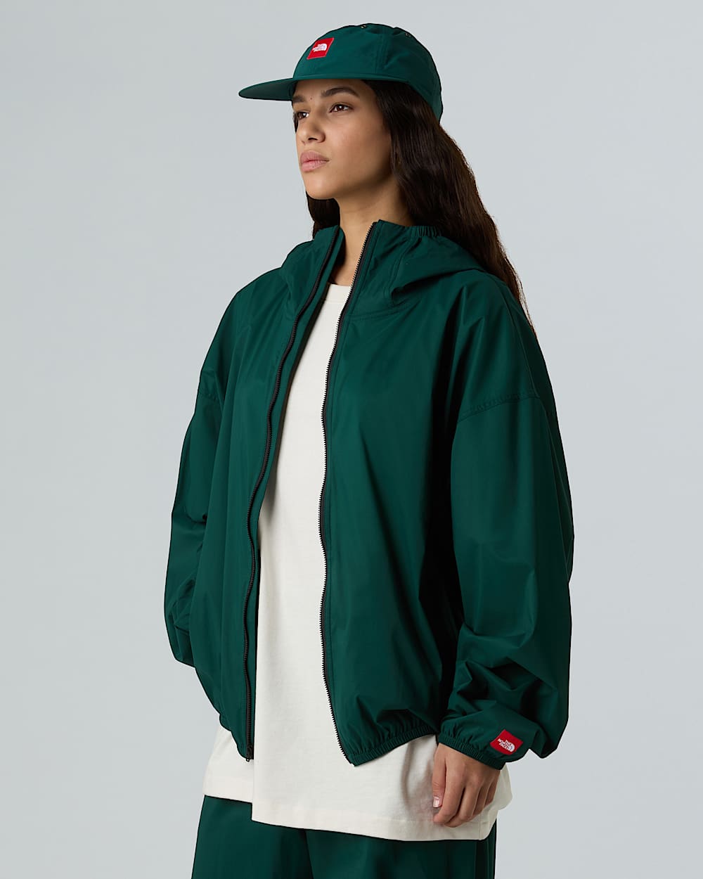 Veste  capuche coupevent compressible Red Box unisexe TNF alt14