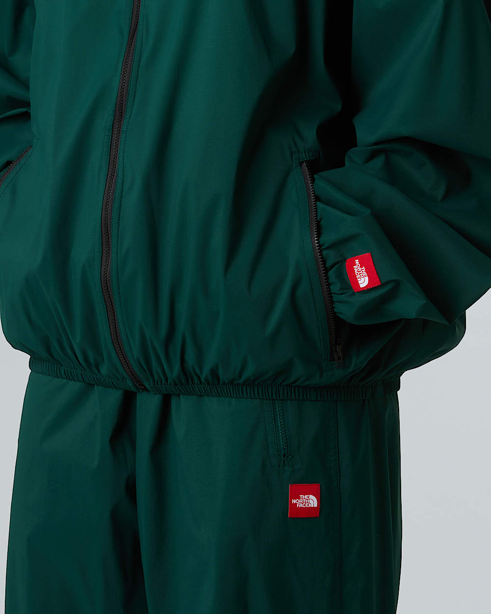 Veste  capuche coupevent compressible Red Box unisexe TNF alt16