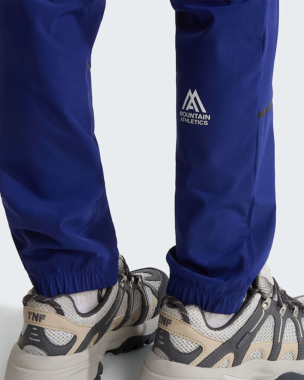 Geweven Mountain Athleticsbroek voor tieners TNF Bold Blue ALT5