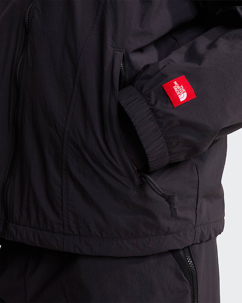 Giacca TNF Red Box in nylon foderata in pile unisex TNF ALT21