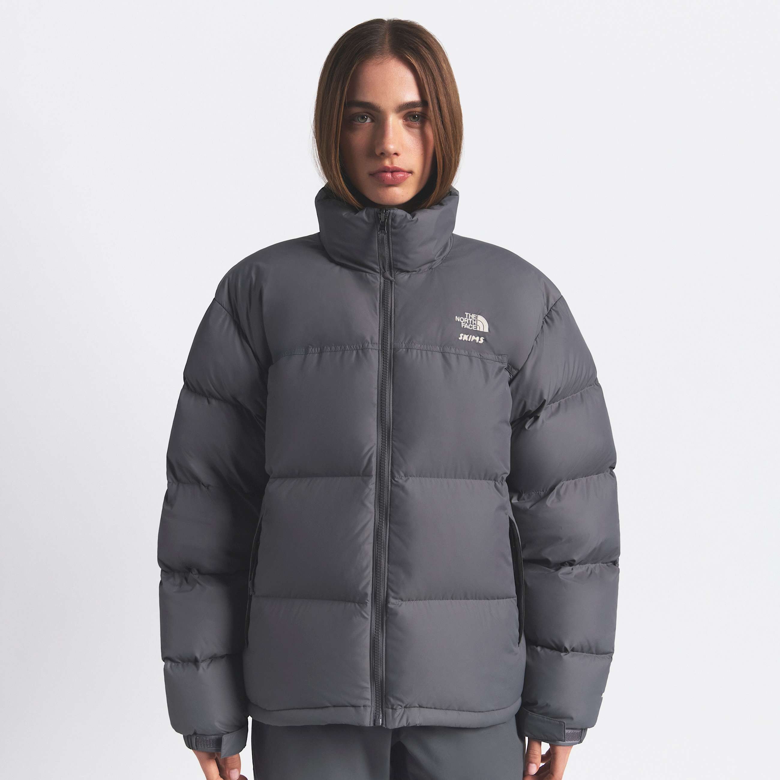 The North Face X SKIMS 1996 Nuptse Jacket Unisex TNF SK Gunmetal HERO