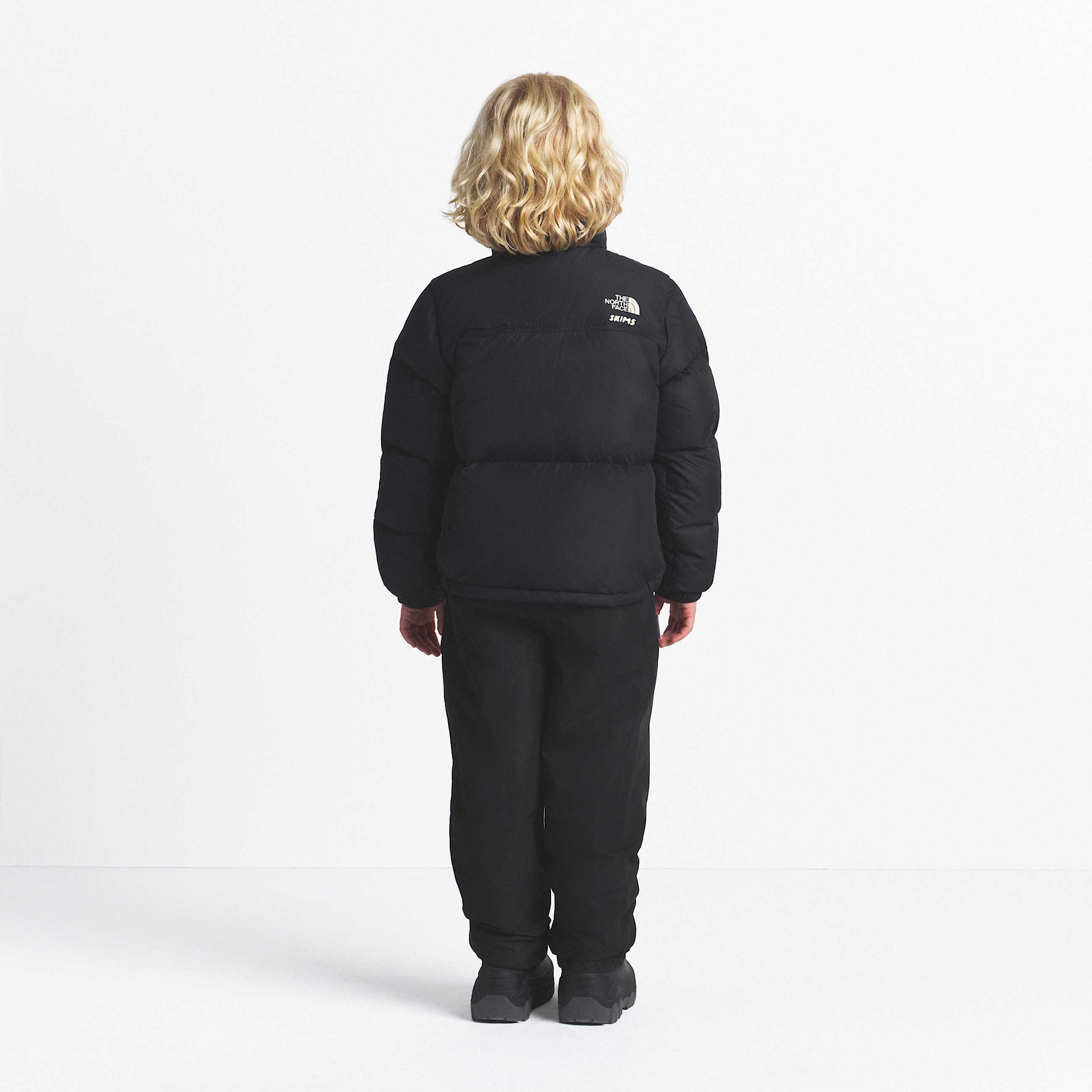 The North Face X SKIMS 1996 Nuptse Jacket Barn TNF ALT2