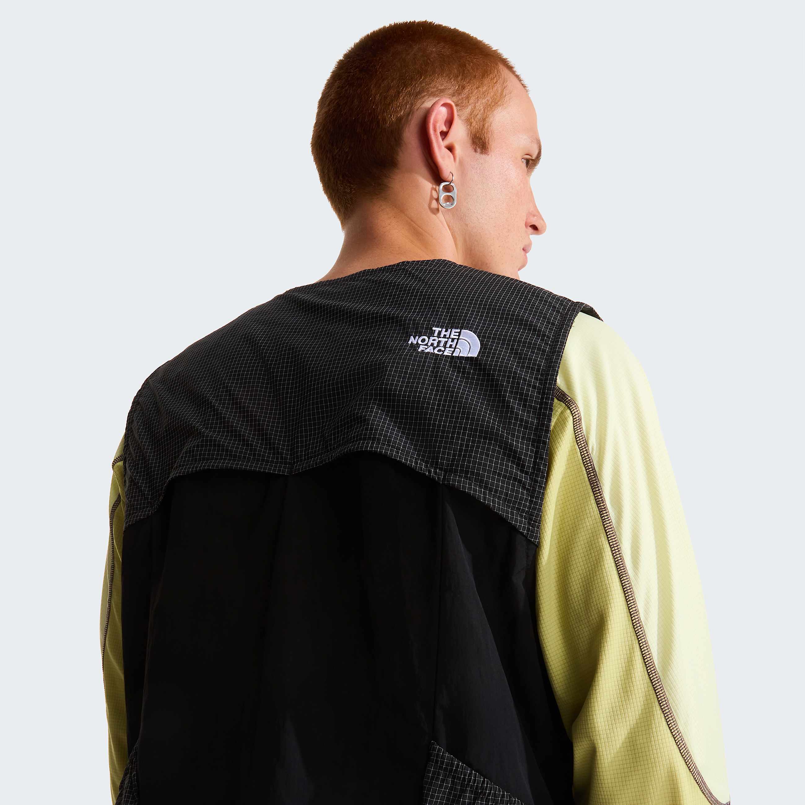 NSE Tech Weste in Unisex TNF ALT8