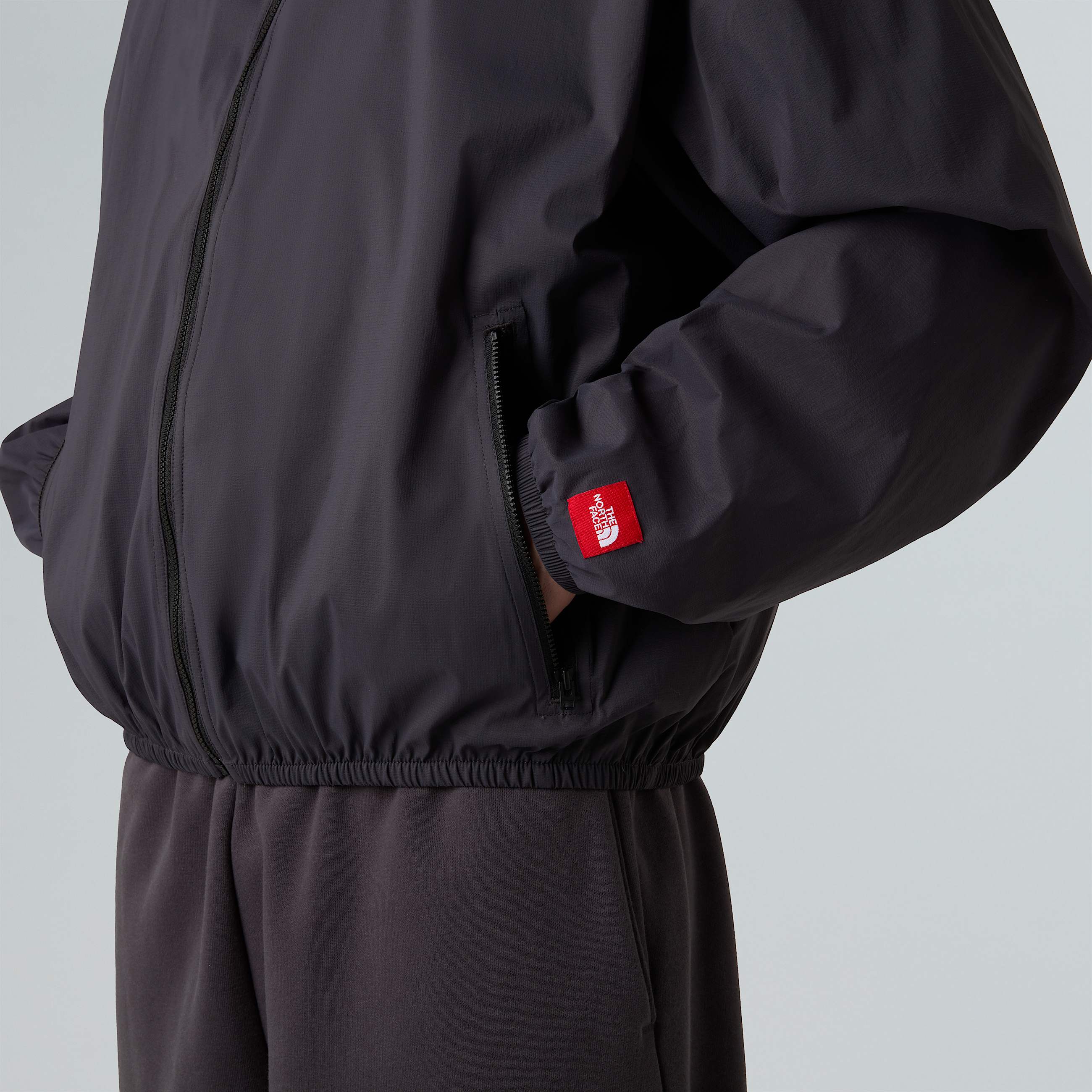 Giacca a vento con cappuccio Red Box Packable unisex TNF ALT9