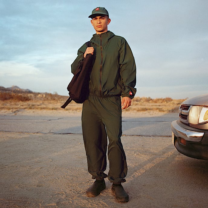 Giacca a vento con cappuccio Red Box Packable unisex TNF Hunter Green HERO