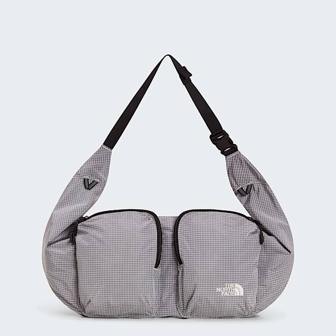 Never Stop Utility Sling Bag TNF Cumulus Cloud HERO